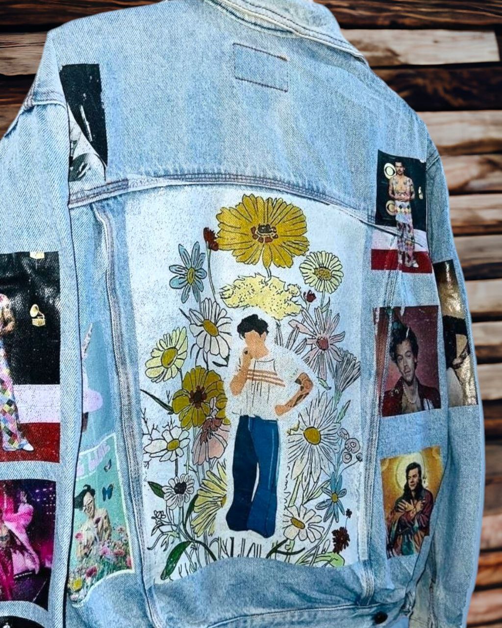 a denim jacket with pictures of harrys house printed on it