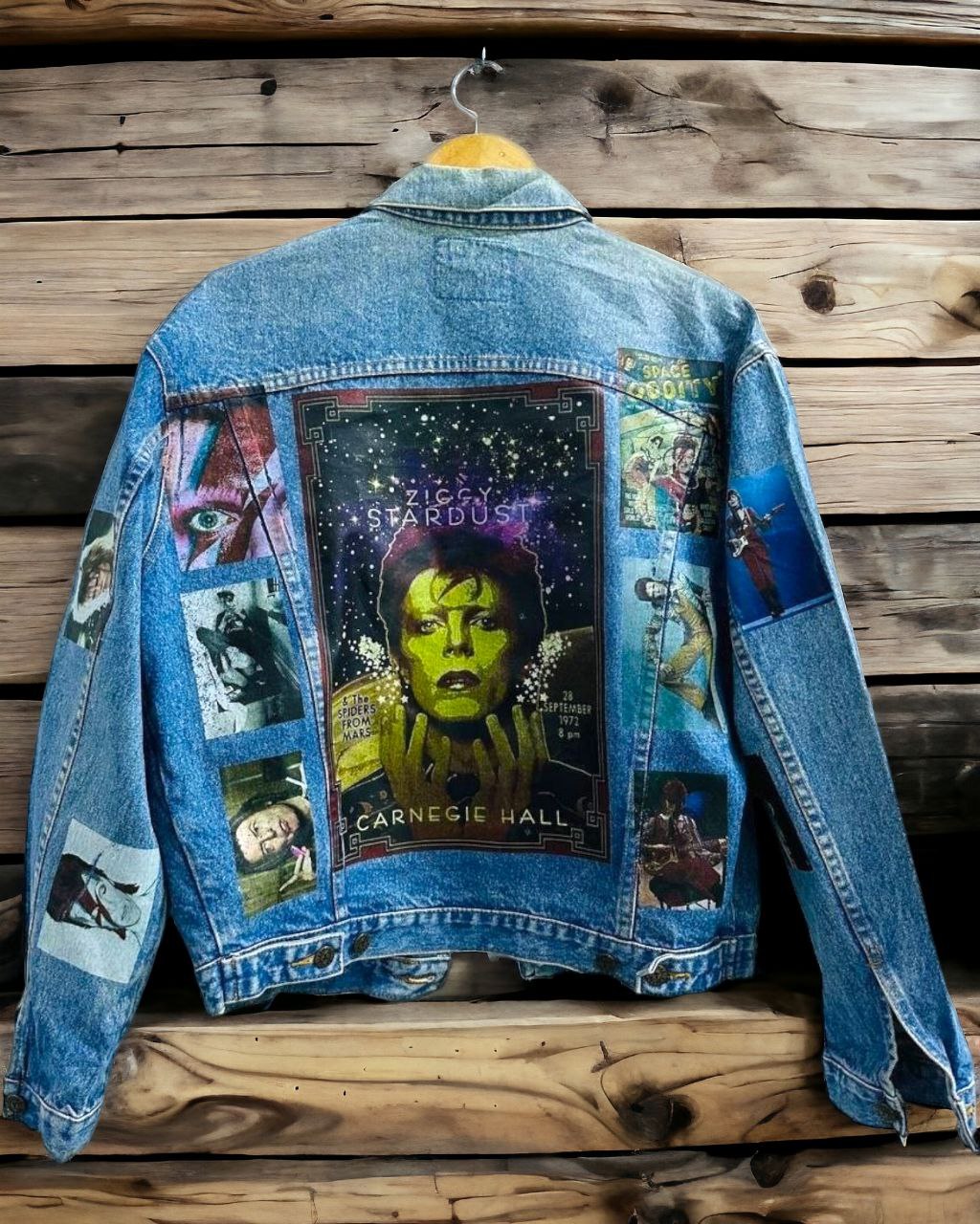 a denim jacket with pictures of david bowie printed on it