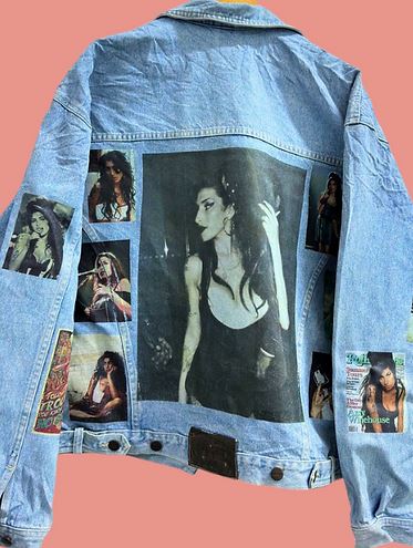 a jean jacket with a picture of a woman on it