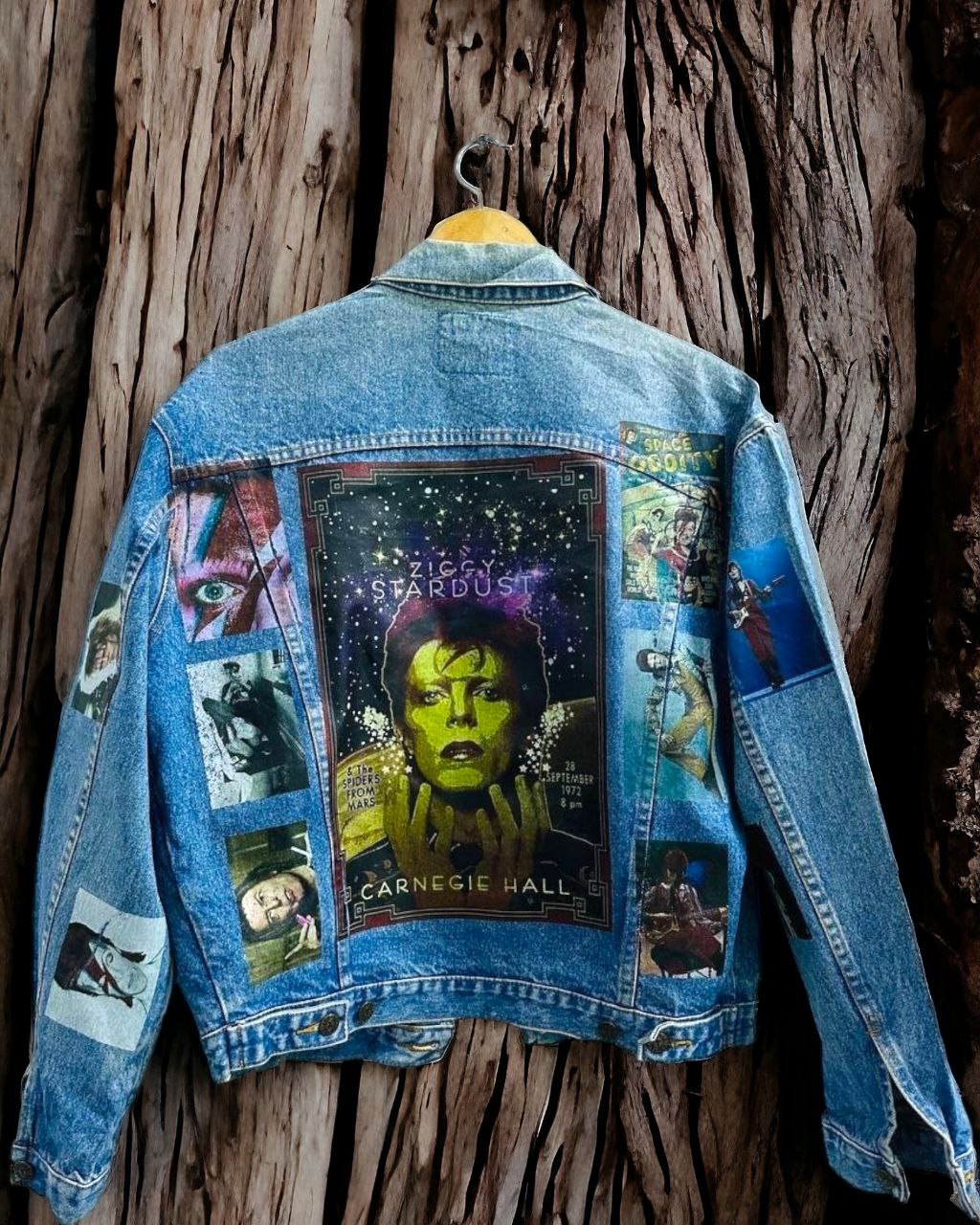 a denim jacket with pictures of david bowie printed on it