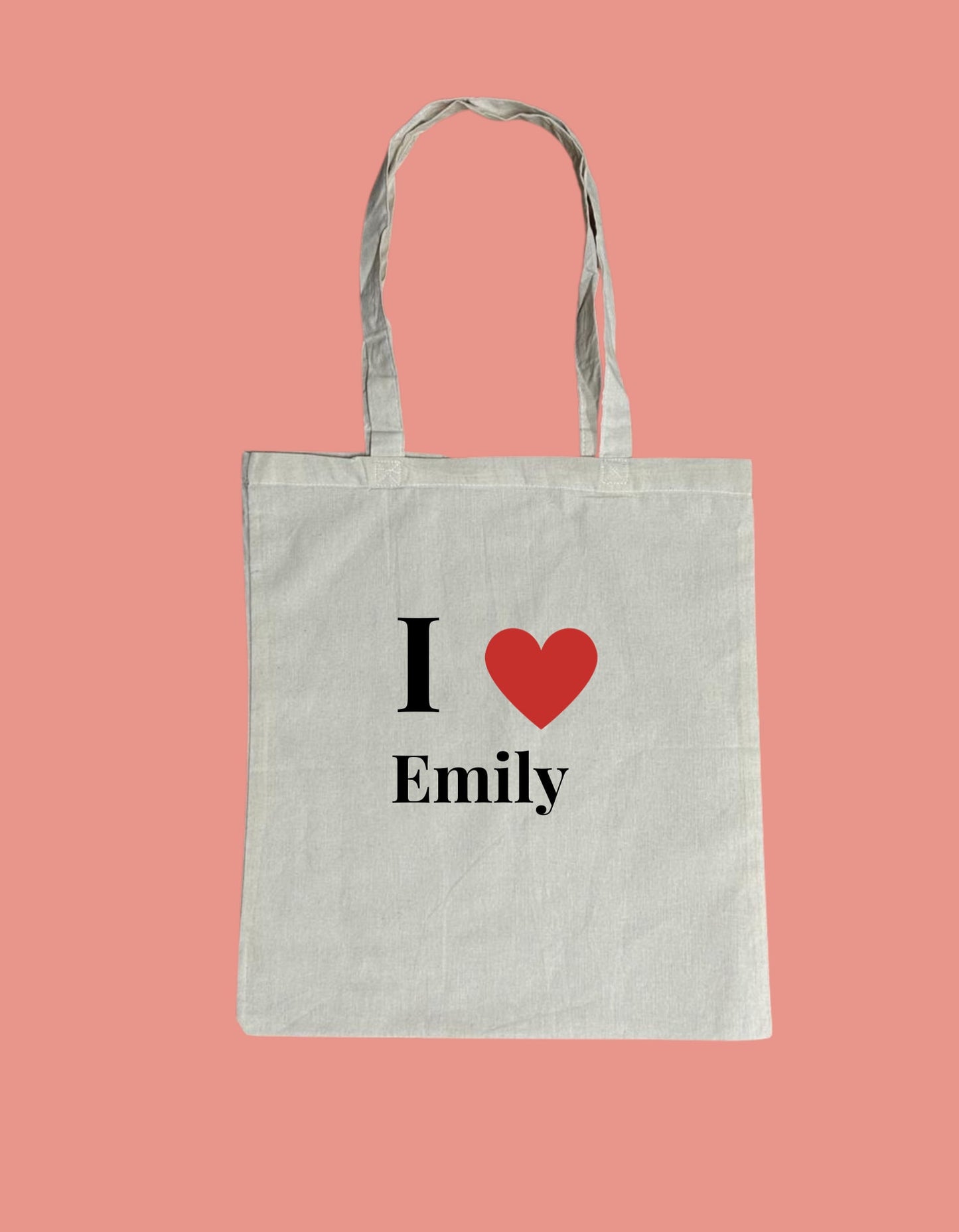 a white bag with a red heart on it