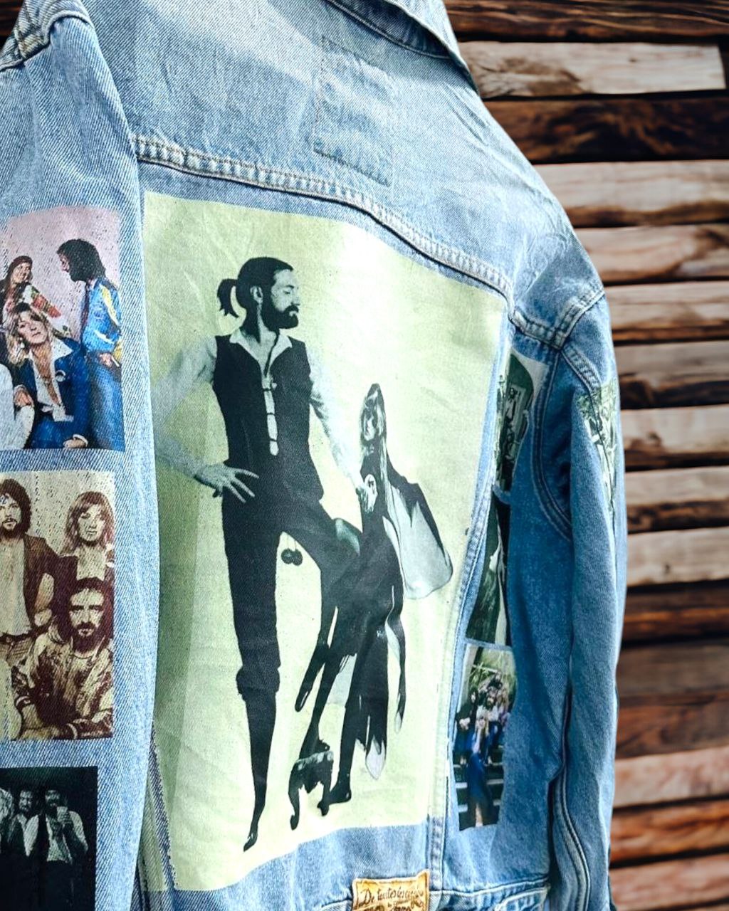 a denim jacket with pictures of fleetwood mac printed on it