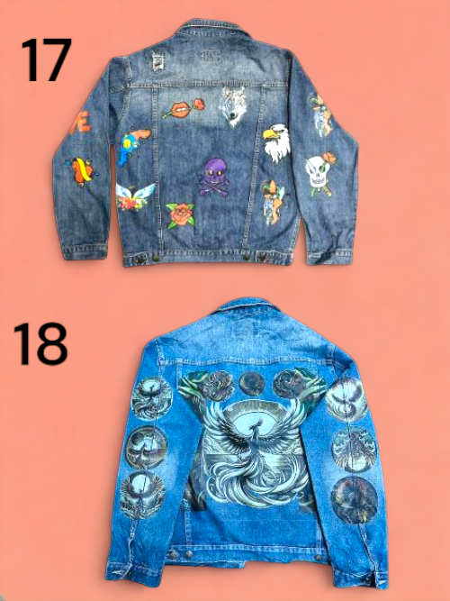 a group of music rock band printed jean jackets hanging on a wooden wall