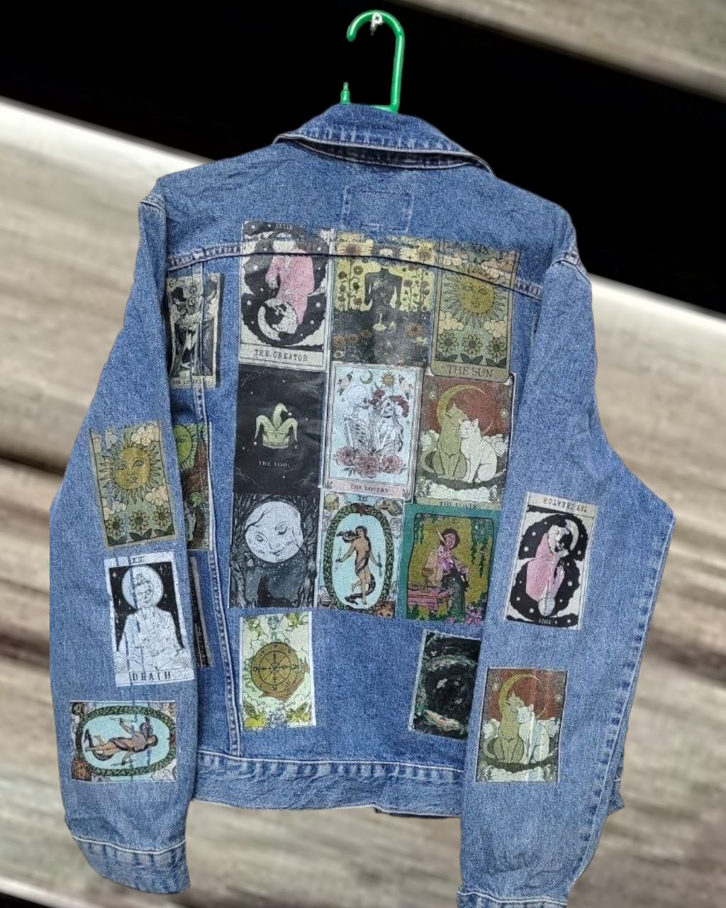 a picture oftarrot cards printed denim jackets