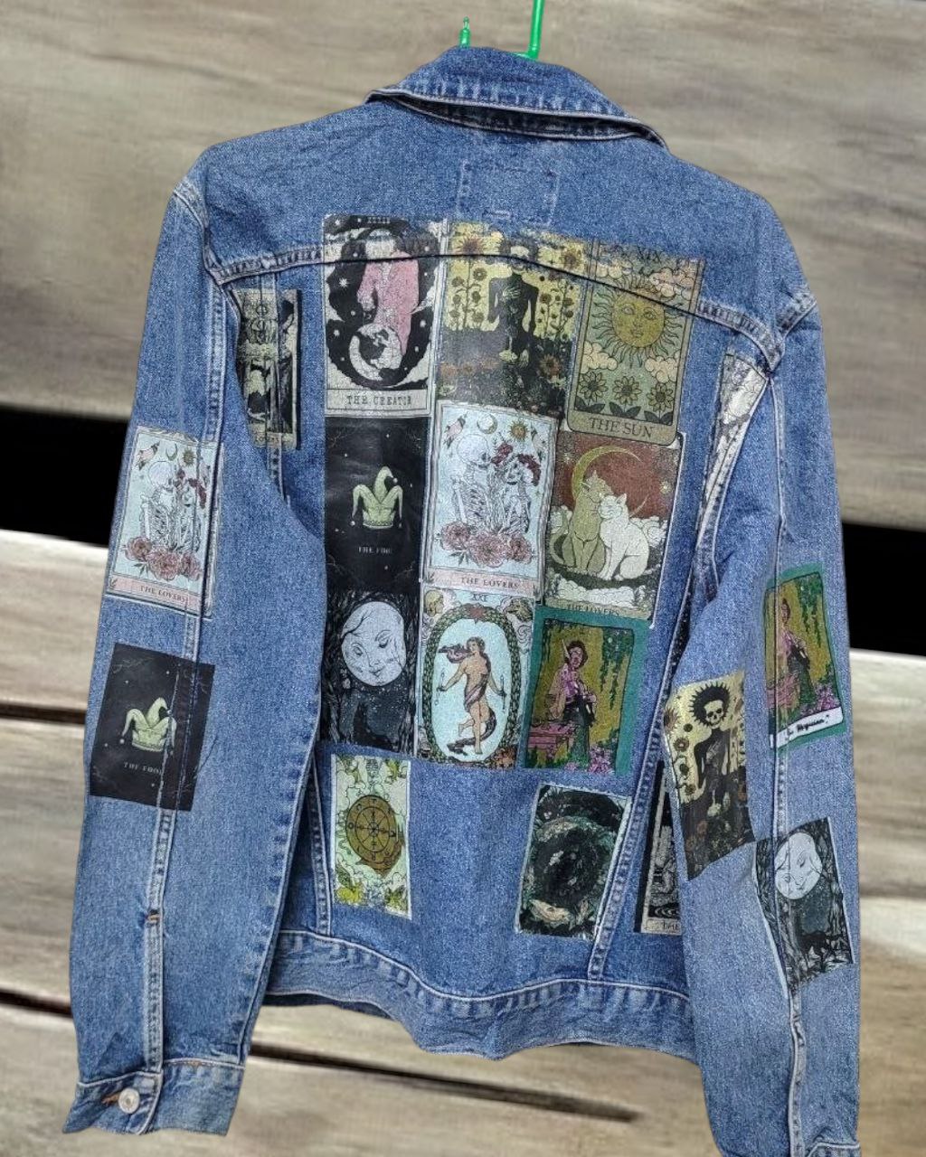 a picture oftarrot cards printed denim jackets