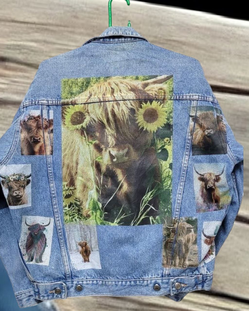 a denim jacket with pictures of  himalayan cow printed on it