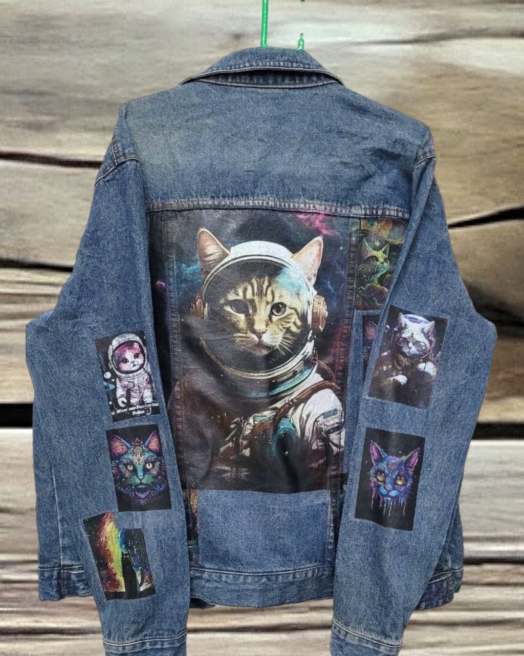 a picture of space cat printed denim jackets