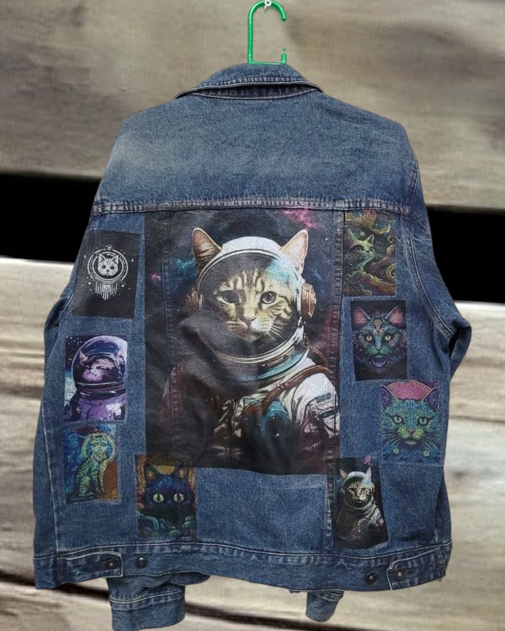 a picture of space cat printed denim jackets