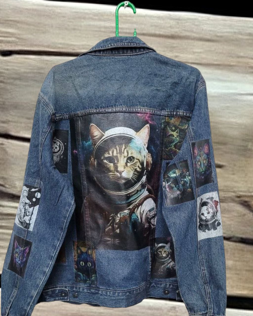 a picture of space cat printed denim jackets