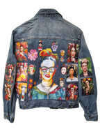 Denim jacket with artistic portraits and floral designs on a white background