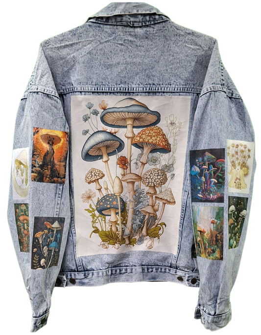 Denim jacket with mushroom-themed patchwork design on a white background