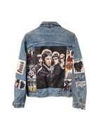 Denim jacket with a collage of images on the back, featuring a band.