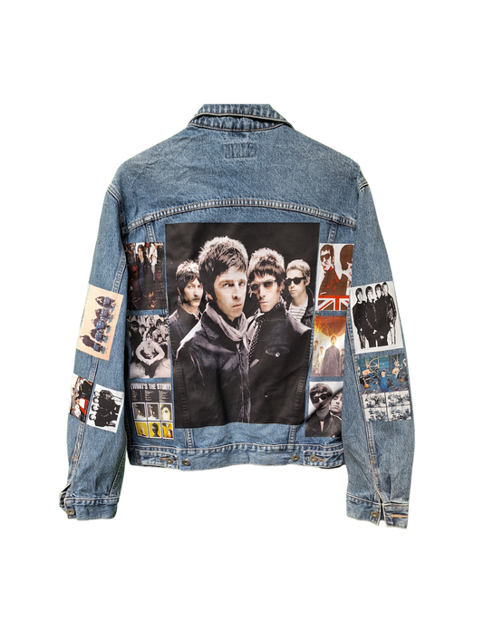 Denim jacket with a collage of images on the back, featuring a band.