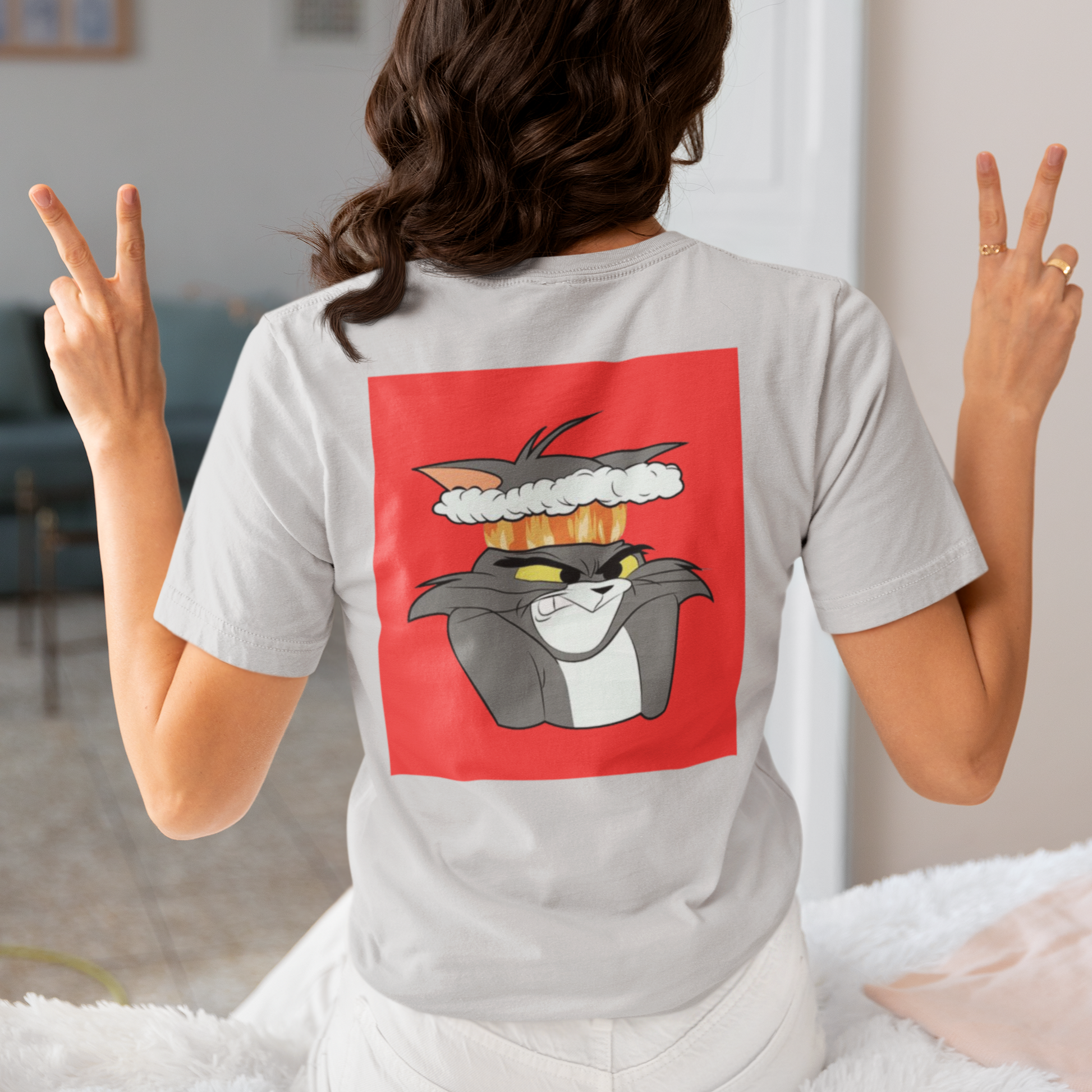 a picture of a woman wearing a grey Tom and Gerry cartoon  t - shirt 