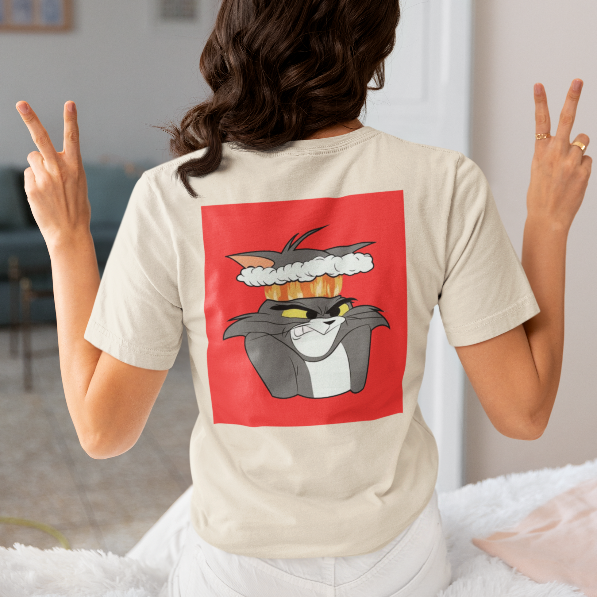 a picture of a woman wearing a white Tom and Gerry cartoon  t - shirt 