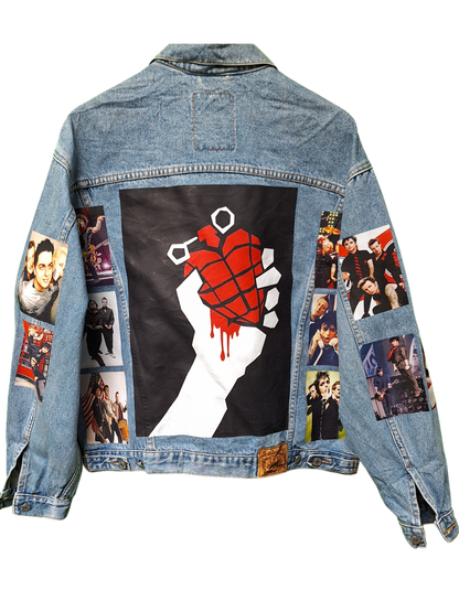 Denim jacket with graphic design and collage of portraits on a white background