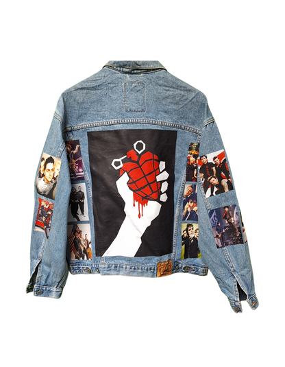 Denim jacket with graphic designs on a white background
