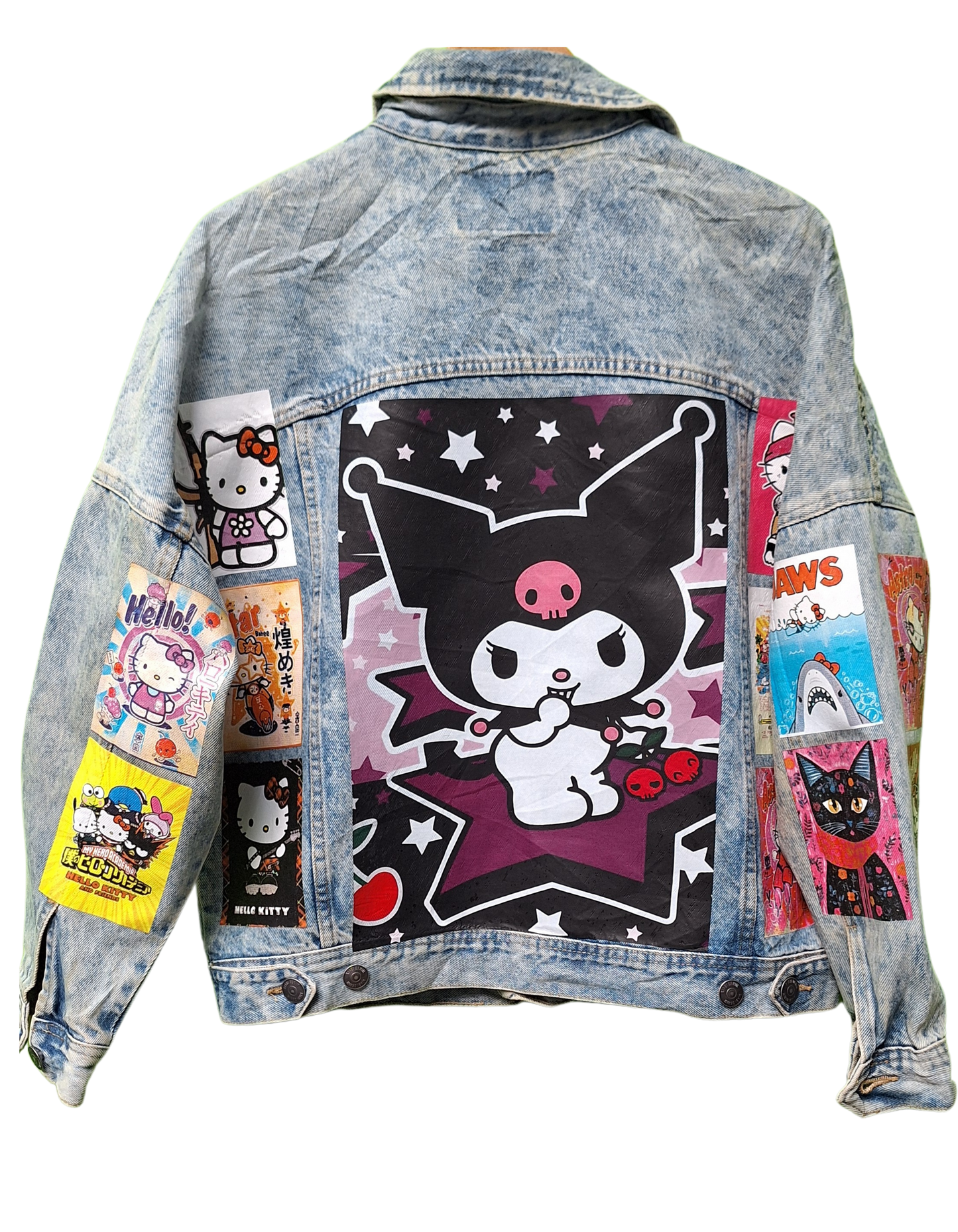 Denim jacket with cartoon character patches on a white background