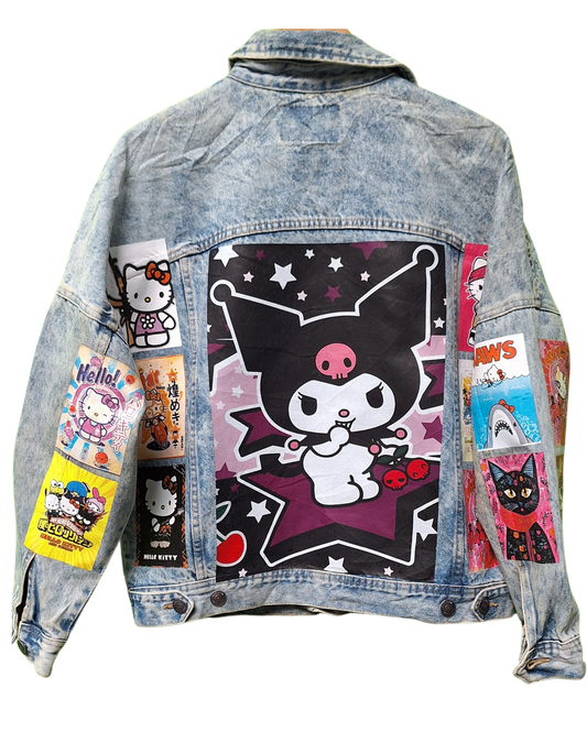 Denim jacket with cartoon character patches on a white background
