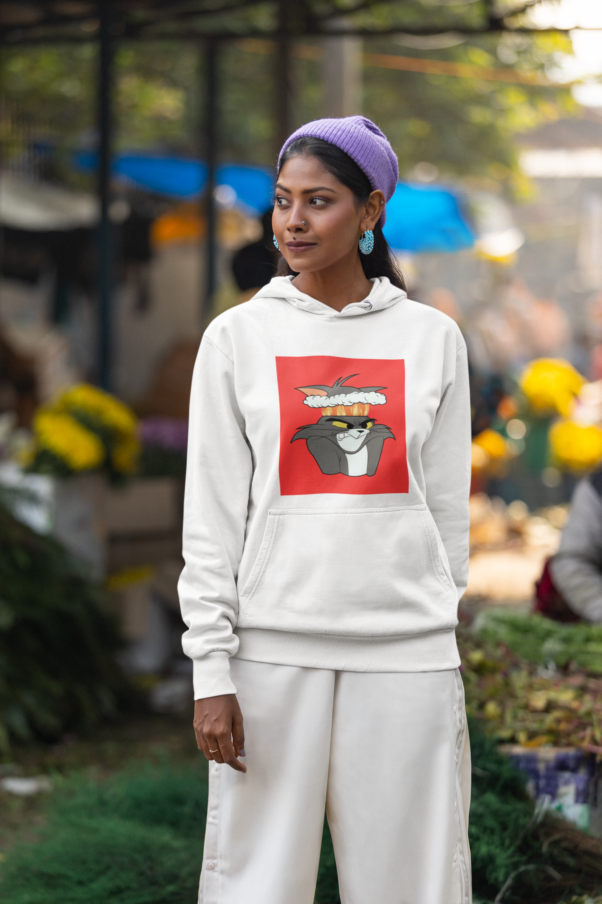 a picture of a woman wearing a white tom Cartoon from tom and gerry hoodie