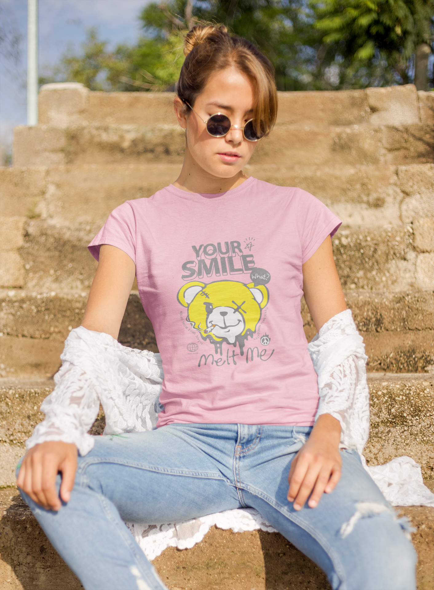 a woman wearing a pink panda letter and expression T-shirt