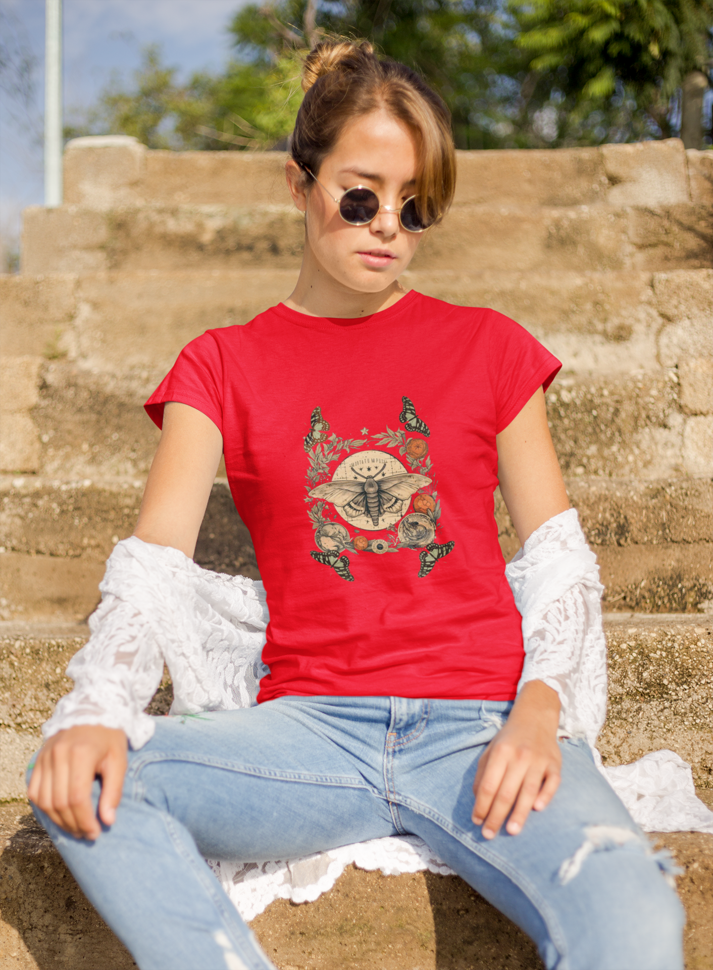 a picture of a woman wearing a red Bohemian moth t - shirt 