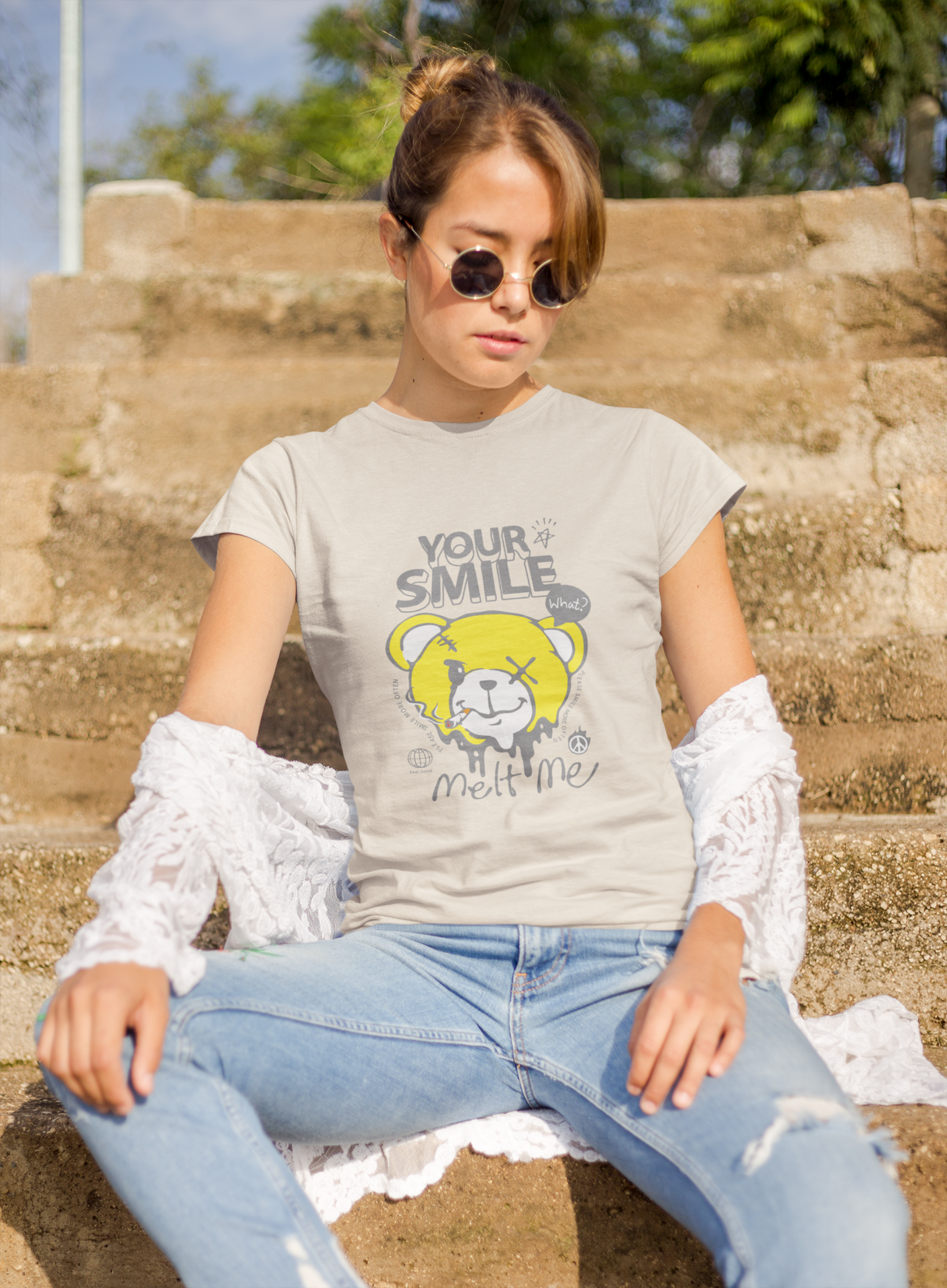 a woman wearing a beige panda letter and expression T-shirt