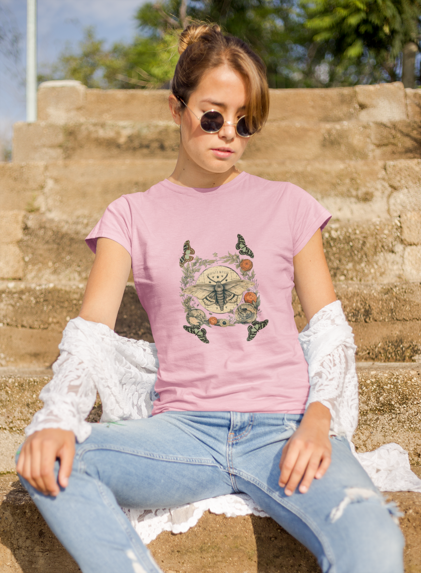 a picture of a woman wearing a pink Bohemian moth t - shirt 