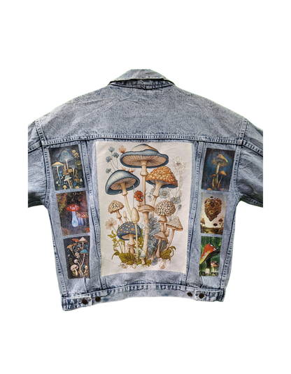 Denim jacket with mushroom illustrations on a white background