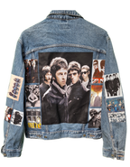Denim jacket with collage of images and a Union Jack flag on a white background