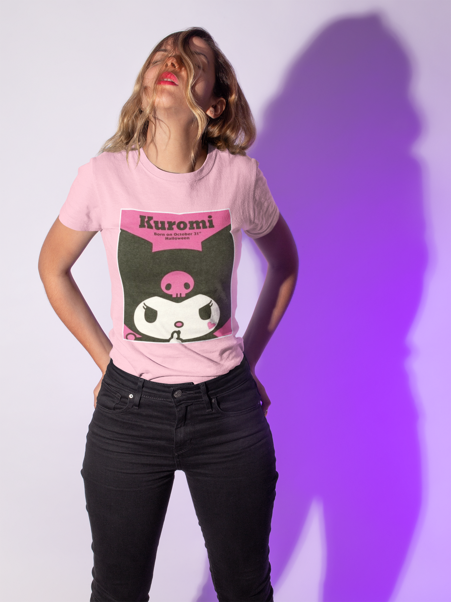 a woman wearing a pink Kuromi Hello Kitty T-shirt