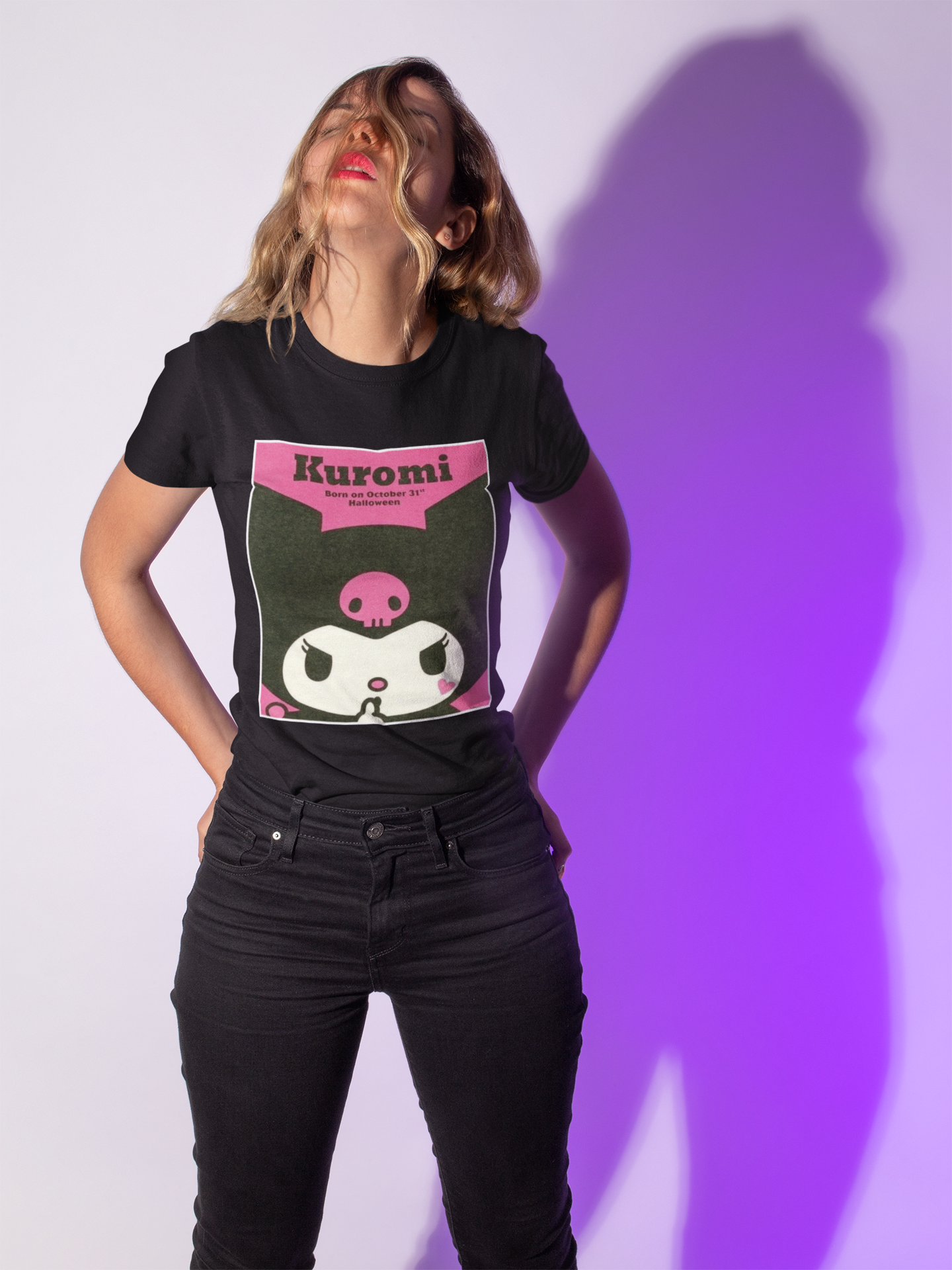 a woman wearing a black Kuromi Hello Kitty T-shirt