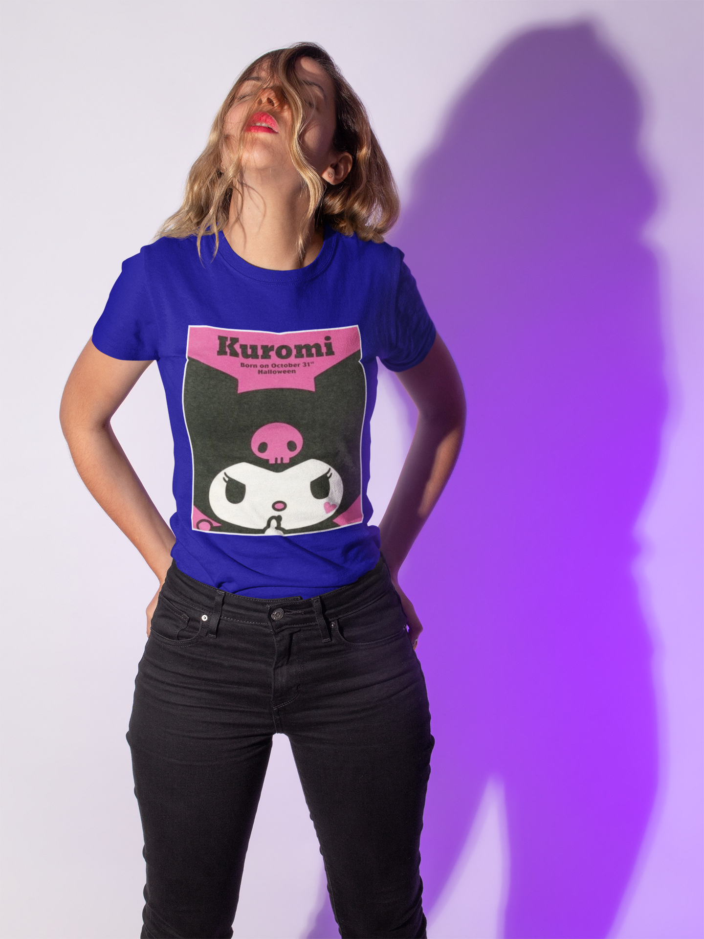 a woman wearing a blue Kuromi Hello Kitty T-shirt