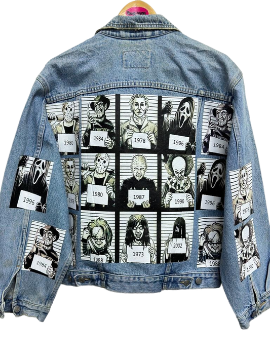 a denim jacket with pictures of people on it